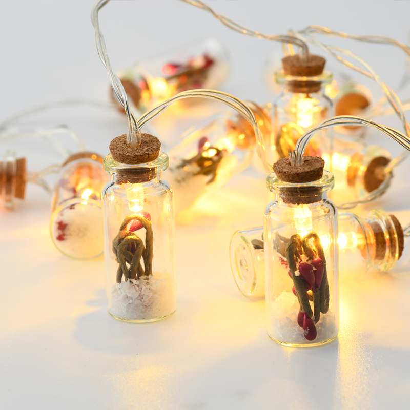 xi10ww2a.png ACA Lighting XI10WW2A Мини стъклена бутилка – червени плодчета 10 LED батерии 2×AA топла светлина IP20 135 + 30см прозрачен кабел